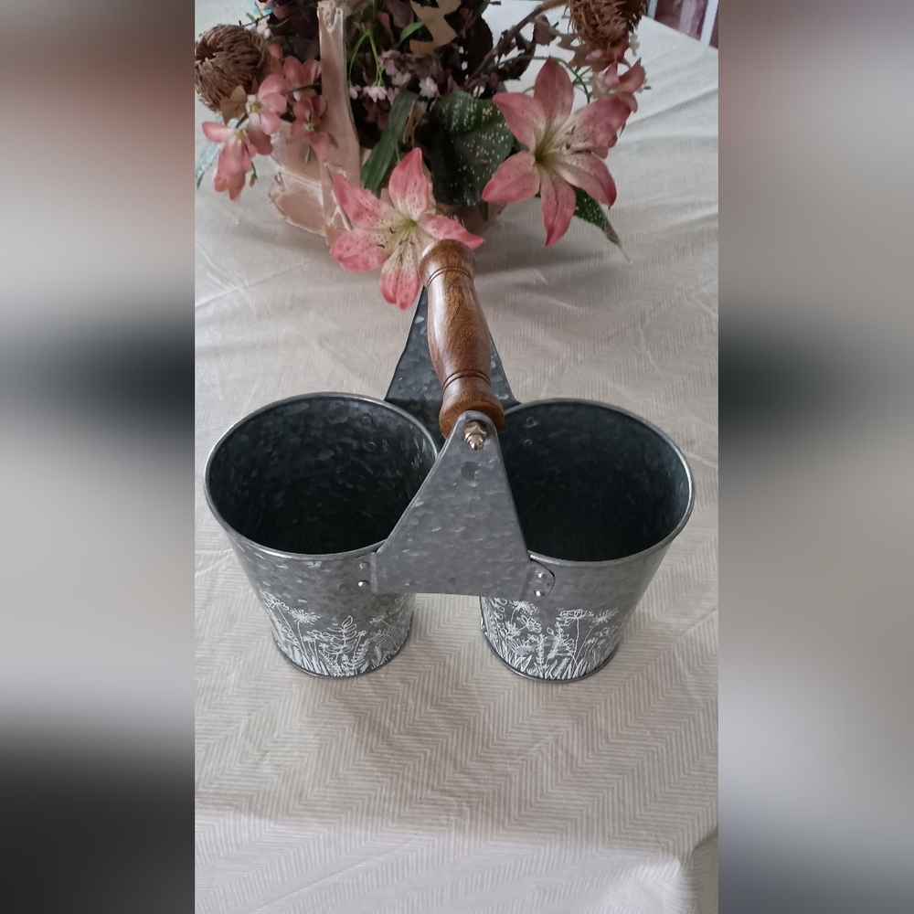 Flower etched gardening pail